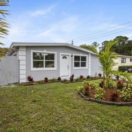 Buy this 3 bed house on 3062 Southeast Fairmont Street in Martin County, FL 34997
