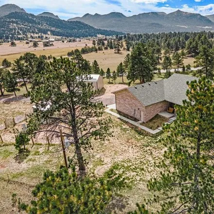 Buy this 4 bed house on 1701 Devils Gulch Road in Estes Park, CO 80517