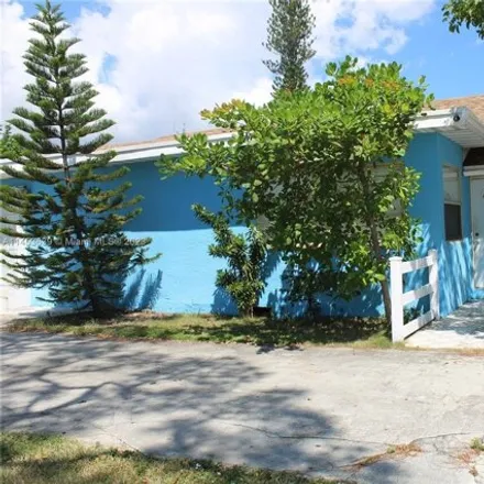 Buy this 3 bed house on 1320 10th Avenue North in Lake Worth Beach, FL 33460