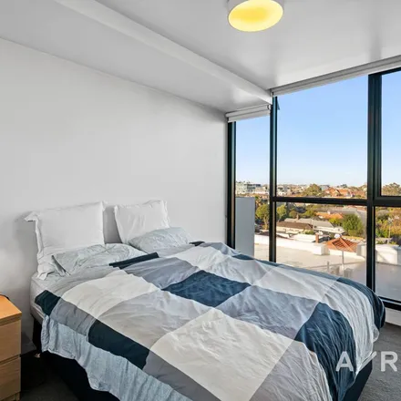 Rent this 2 bed apartment on Stop 23: Flockhart Street in Victoria Street, Abbotsford VIC 3067