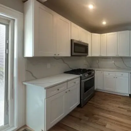 Rent this 4 bed apartment on #1,158 Morrison Avenue in Powder House, Somerville