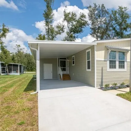 Buy this studio apartment on 505 Royal Palm Drive in DeLand, FL 32724