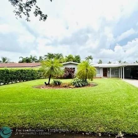 Buy this 3 bed house on 4387 Northeast 17th Terrace in Coral Hills, Broward County