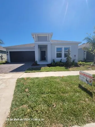 Rent this 4 bed house on unnamed road in Kissimmee, FL 34758