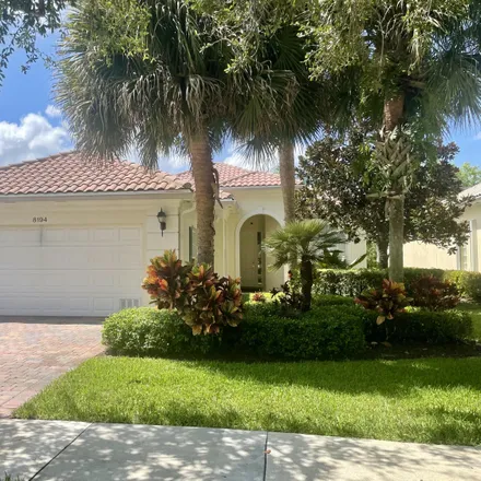 Rent this 3 bed house on Villagewalk Circle in Wellington, Palm Beach County