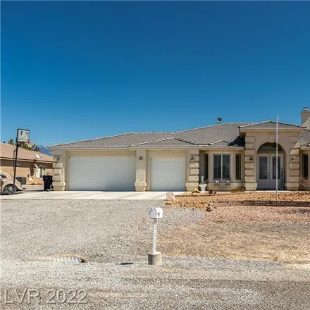 Buy this 4 bed house on 2663 Rimrock Avenue in Pahrump, NV 89048