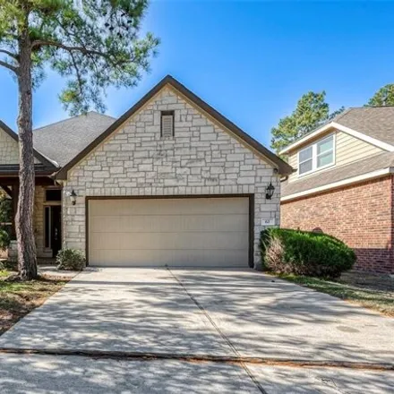 Rent this 4 bed house on 64 Sawbridge Circle in The Woodlands, TX 77389