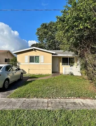 Buy this 2 bed house on 1323 Northwest 58th Avenue in Lauderhill, FL 33313