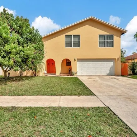 Buy this 3 bed house on 642 Toxaway Drive in Lake Belvedere Estates, Palm Beach County