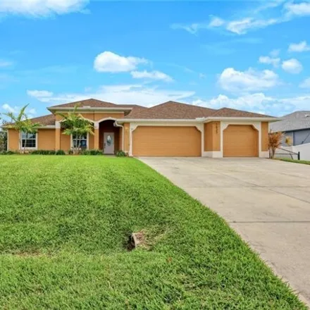Buy this 4 bed house on 1499 Southwest 19th Place in Cape Coral, FL 33991