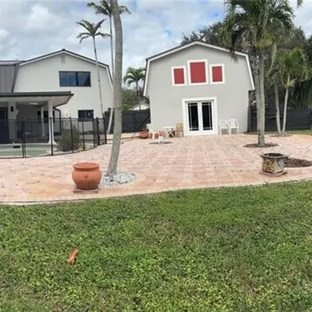 Buy this 4 bed house on Northwest 14th Street in Plantation, FL 33323