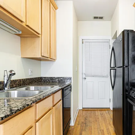 Rent this 2 bed apartment on 628 W Roscoe St