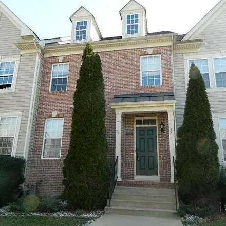 Rent this 3 bed townhouse on 21968 Weeping Willow Lane in Patuxent Park, Lexington Park