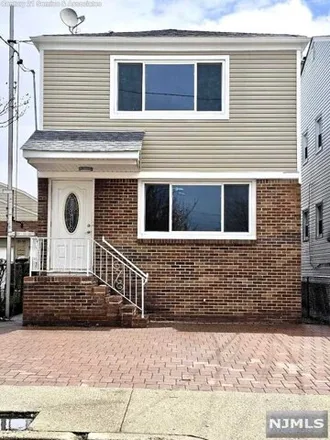 Rent this 3 bed house on 119 Patterson Street in Harrison, NJ 07029