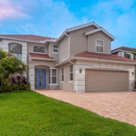 Rent this 4 bed house on 8234 Heritage Club Drive in West Palm Beach, FL 33412