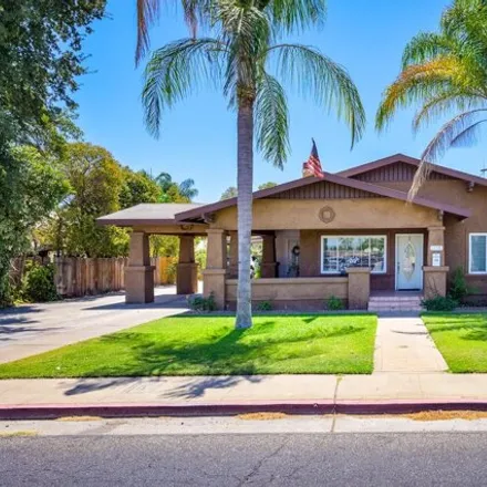 Buy this 4 bed house on Dinuba Public School Administration Building in 1327 East El Monte Way, Dinuba
