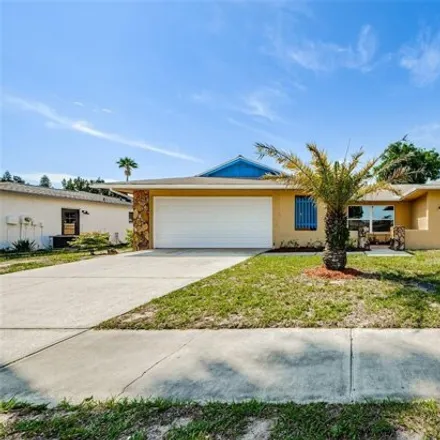 Rent this 3 bed house on Cedar Run Drive in Jasmine Estates, FL 34668