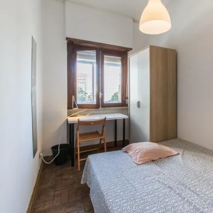 Rent this 6 bed room on Rua de Sant'Ana à Lapa in 1350-290 Lisbon, Portugal