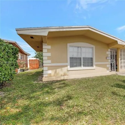 Rent this 4 bed house on 6723 Camelia Drive in Miramar, FL 33023