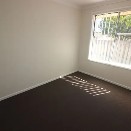 Rent this 3 bed apartment on 26 Denton Park Drive in Rutherford NSW 2320, Australia