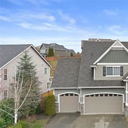 Buy this 4 bed house on 27546 254th Way Southeast in Maple Valley, WA 98038