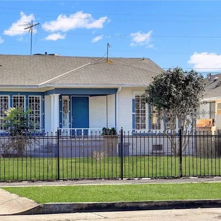 Buy this 4 bed house on 1040 West 71st Street in Los Angeles, CA 90044