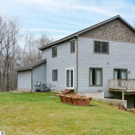 Buy this 5 bed house on West Beech Bark Trail in Kasson Township, MI