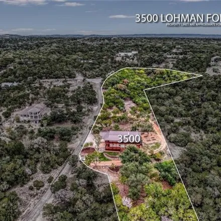 Buy this 4 bed house on 3500 Lohmans Ford 9 Rd in Lago Vista, Texas