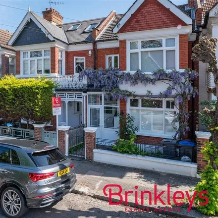 Rent this 4 bed townhouse on Farquhar Road in London, SW19 8DA