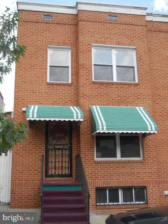 Rent this 3 bed townhouse on Stoddard Alley in Baltimore, MD 21217