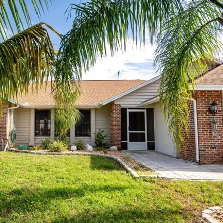 Buy this 3 bed house on 2211 Southeast Glover Street in Port Saint Lucie, FL 34984