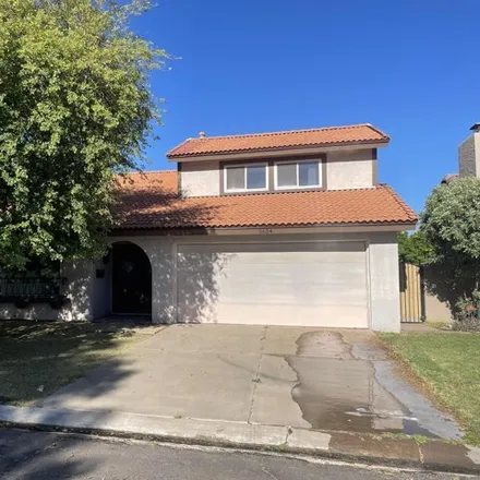 Buy this 4 bed house on 5634 South Outrigger Road in Tempe, AZ 85283