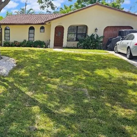 Rent this 2 bed house on 6090 Kendrick Street in North Palm Beach Heights, Jupiter