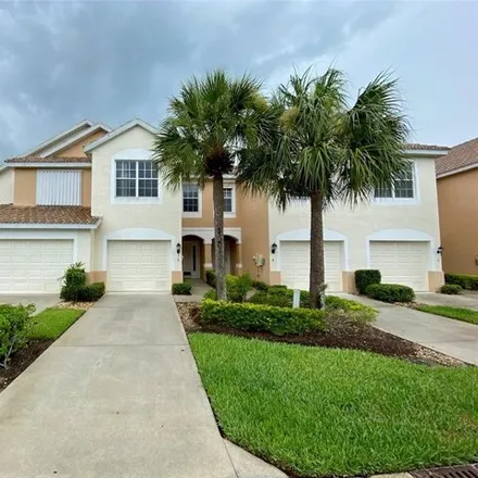 Rent this 3 bed house on 8419 Village Edge Circle in Cypress Lake, FL 33919