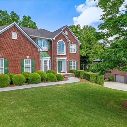 Buy this 6 bed house on 1014 Bradshaw Estates Drive in Holly Springs, GA 30115