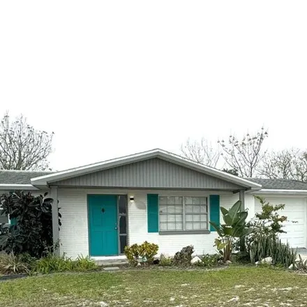 Rent this 2 bed house on 7466 Castanea Drive in Jasmine Estates, FL 34668