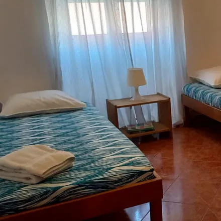 Rent this 7 bed room on Rua Particular à Rua do Cruzeiro in 1300-166 Lisbon, Portugal