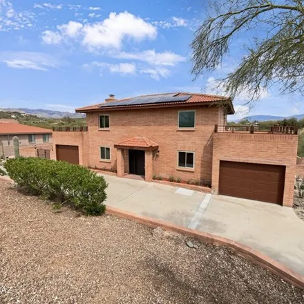Buy this 4 bed house on 6176 East Calle Ojos Verde in Pima County, AZ 85750