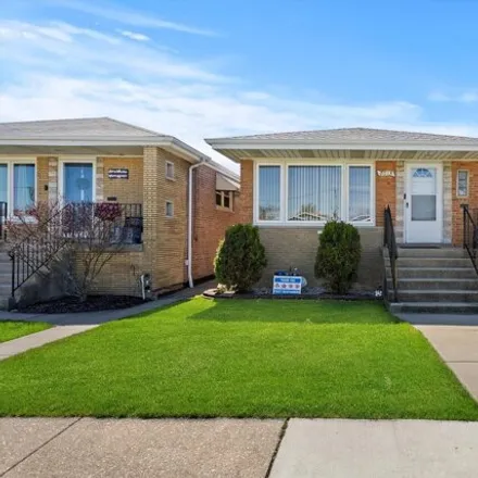 Buy this 3 bed house on 7013 West 63rd Place in Chicago, IL 60638