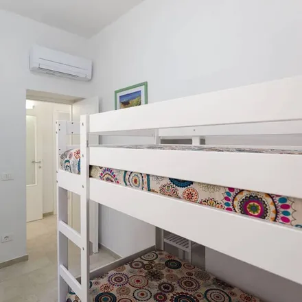 Rent this 2 bed apartment on 57038 Rio Marina LI