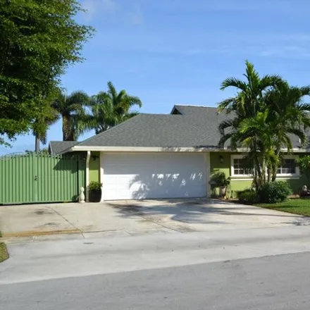 Buy this 3 bed house on 1110 West Woodcrest Road in Palm Beach County, FL 33417