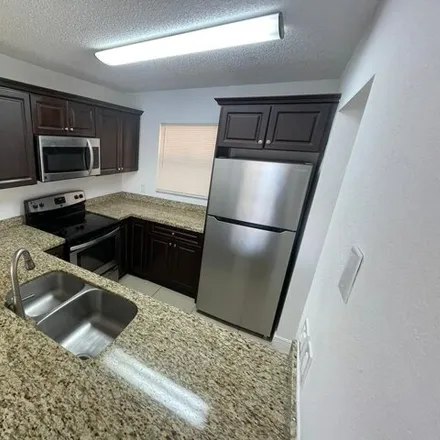 Rent this 2 bed condo on 1545 Lake Crystal Drive in Golden Lakes, Palm Beach County