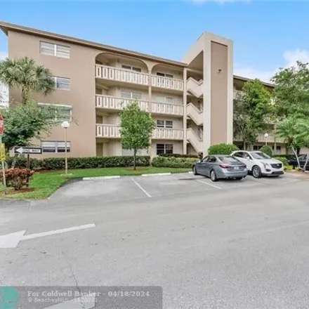 Rent this 2 bed condo on Wynmoor Circle in Coconut Creek, FL 33066