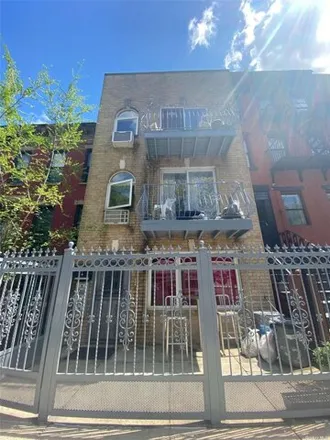 Buy this 9 bed house on 32 Eldert Street in New York, NY 11207