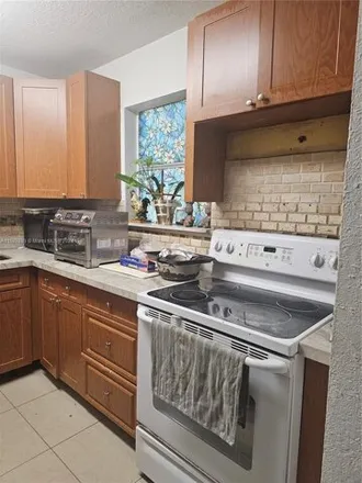 Buy this 2 bed condo on 575 West 69th Street in Hialeah, FL 33014