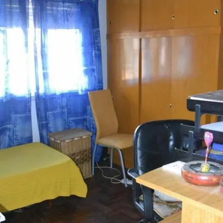 Buy this 3 bed house on Intendente Carlos Ratti 494 in Partido de Ituzaingó, B1714 LVH Ituzaingó