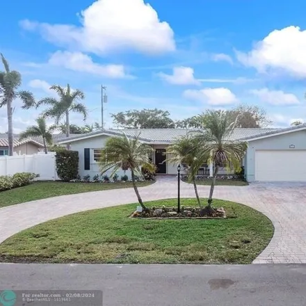 Buy this 4 bed house on 5339 Northeast 16th Avenue in Coral Hills, Fort Lauderdale