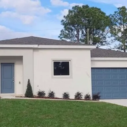 Buy this 4 bed house on 1253 Sexton Road Southwest in Palm Bay, FL 32908