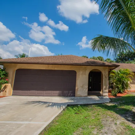 Buy this 3 bed house on 1737 Southwest Beeker Street in Port Saint Lucie, FL 34953