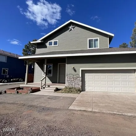 Rent this 3 bed house on 1317 Flag Hollow Road in Navajo County, AZ 85929